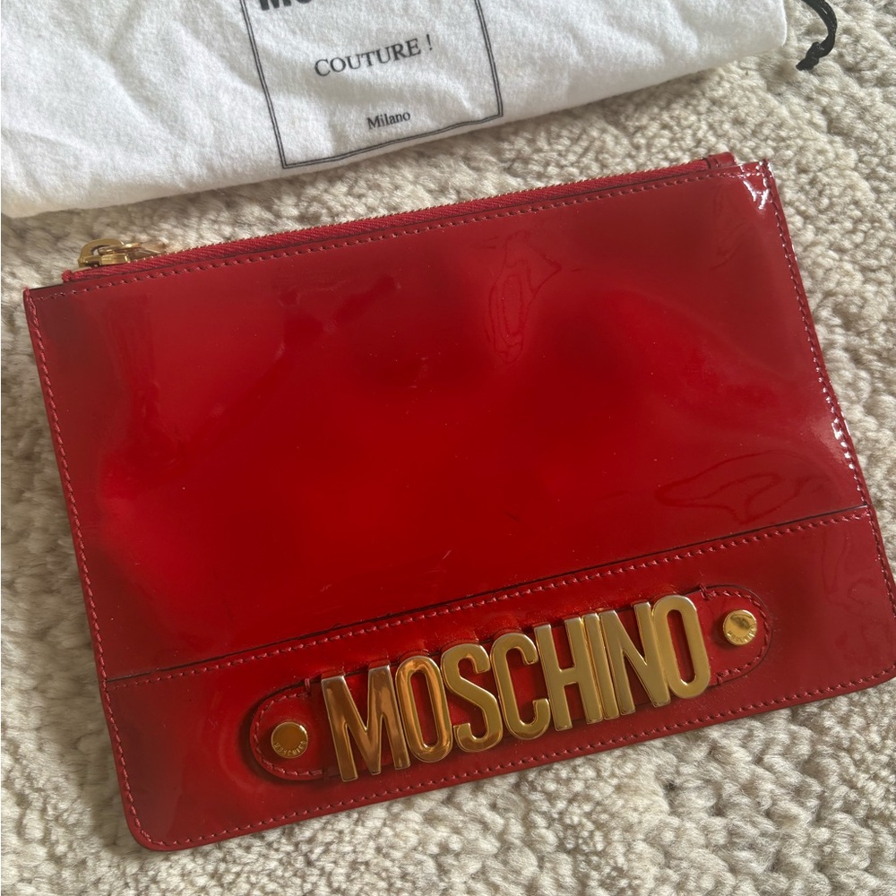 Moschino Patent Leather Zip Clutch in Red with Gold Logo